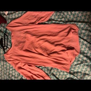 Cute pink blouse with black bow details on back